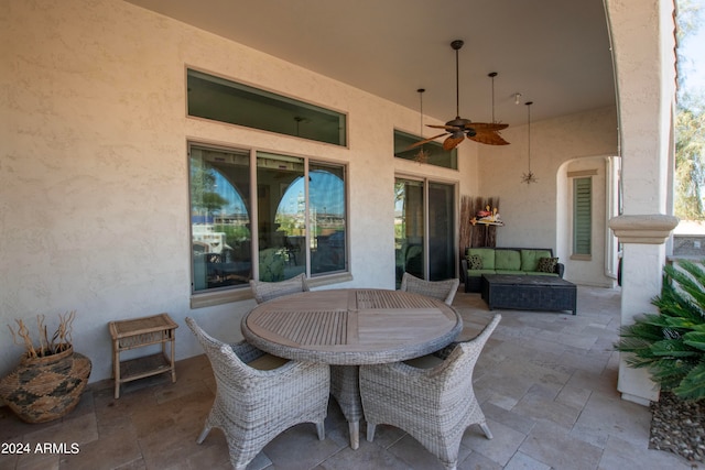 view of patio / terrace featuring ceiling fan