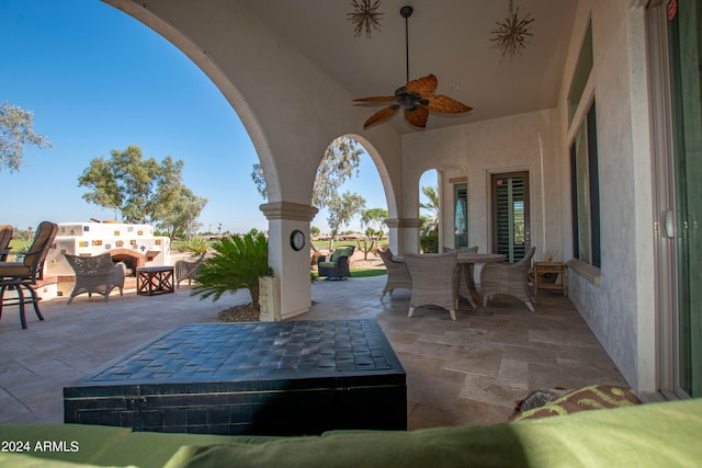 view of patio / terrace with ceiling fan