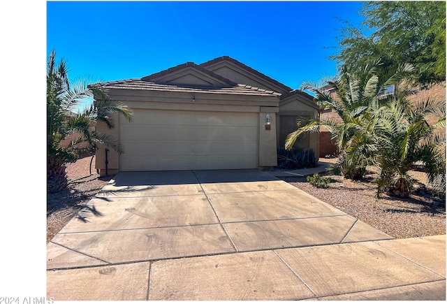 ranch-style house with a garage