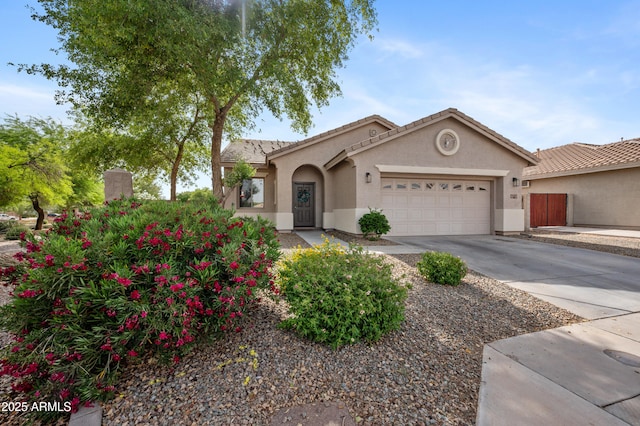 4466 S Brice, Mesa, AZ 85212 - mediterranean / spanish-style home with an attached garage, stucco siding, driveway, and a tiled roof