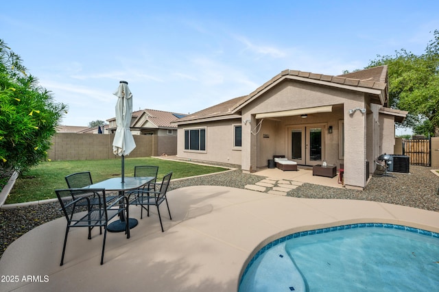 4466 S Brice, Mesa, AZ 85212 - back of property with french doors, stucco siding, a patio, central AC, and outdoor dining space