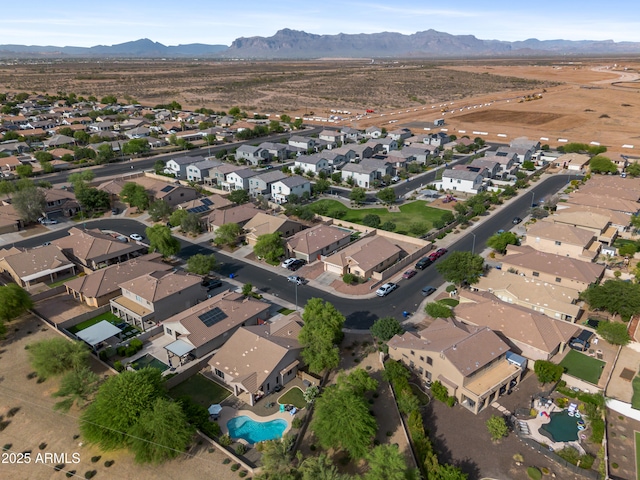 4466 S Brice, Mesa, AZ 85212 - aerial view of property and surrounding area featuring mountains, nearby suburban area, and a pool area