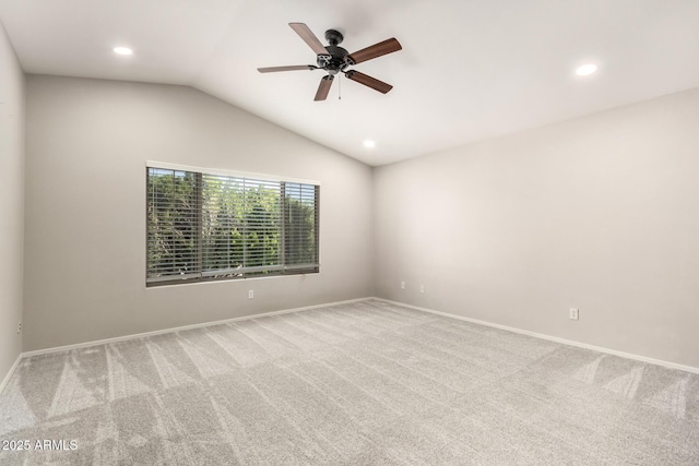 carpeted empty room featuring lofted ceiling, ceiling fan, baseboards, and recessed lighting