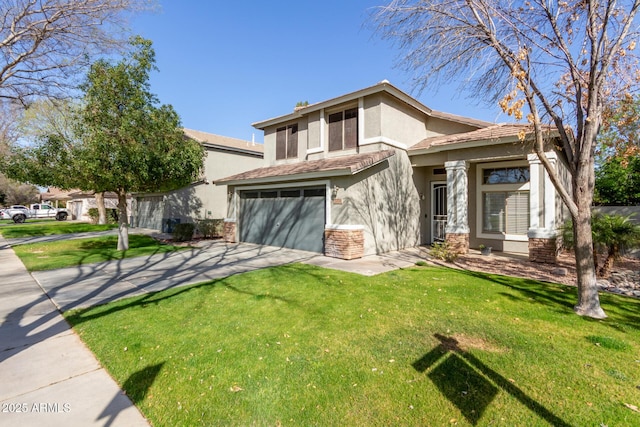 view of front of home with concrete driveway, a tile roof, an attached garage, a front lawn, and stucco siding