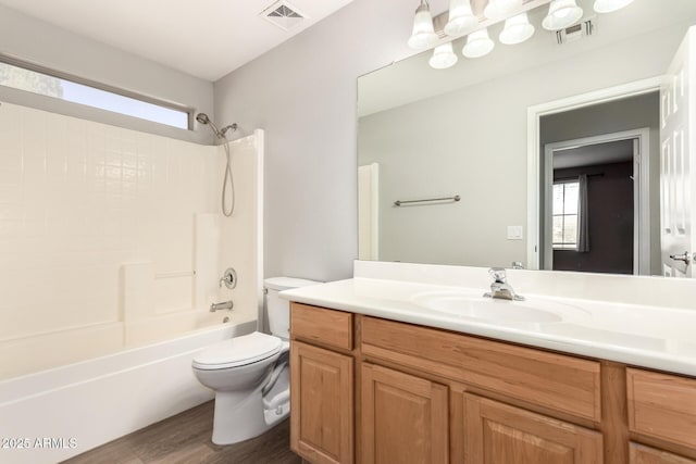 full bath with toilet, shower / bath combination, visible vents, and vanity