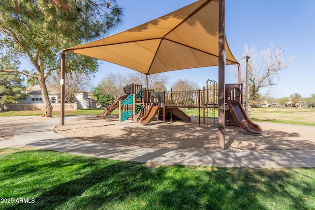 community play area featuring a lawn