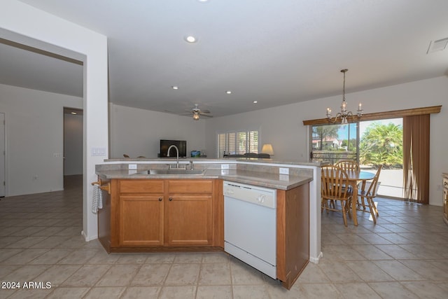 kitchen featuring dishwasher, ceiling fan with notable chandelier, a wealth of natural light, and sink