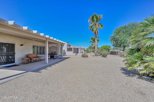 view of yard with a patio area