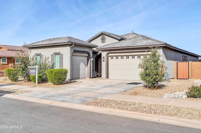 single story home featuring a garage