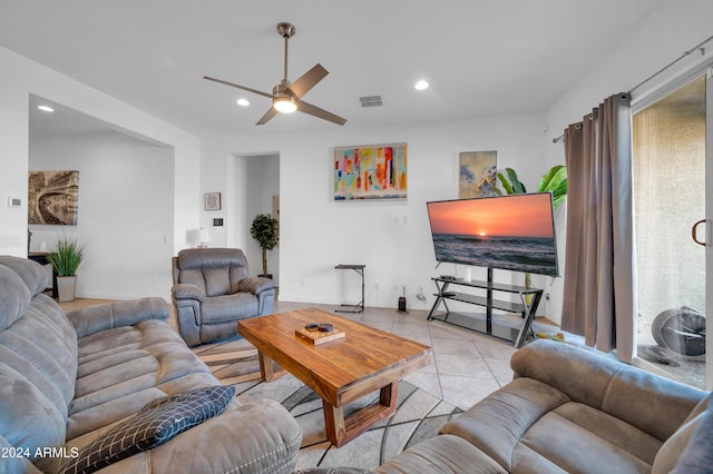 tiled living room featuring ceiling fan