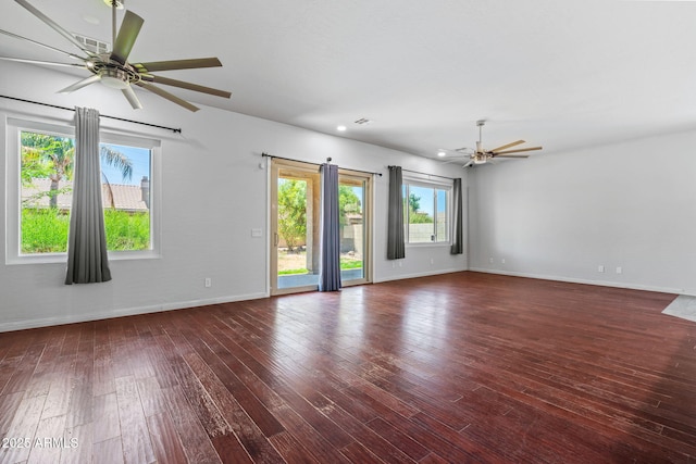7911 E Posada Ave, Mesa, AZ 85212 - unfurnished room with ceiling fan, hardwood / wood-style floors, and recessed lighting