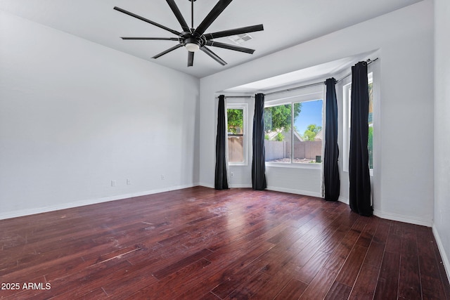 7911 E Posada Ave, Mesa, AZ 85212 - spare room featuring ceiling fan and wood-type flooring