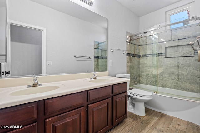 7911 E Posada Ave, Mesa, AZ 85212 - bathroom with combined bath / shower with glass door, wood finished floors, and double vanity