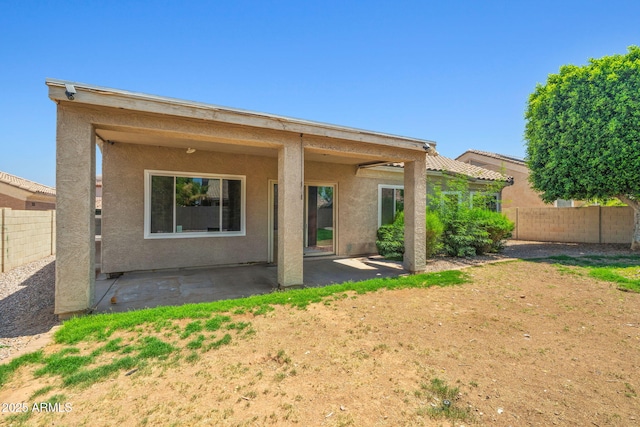 7911 E Posada Ave, Mesa, AZ 85212 - rear view of house featuring a patio area, a fenced backyard, and stucco siding