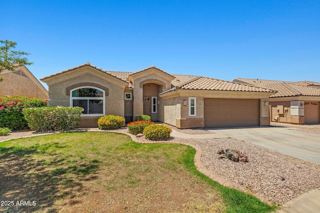 7911 E Posada Ave, Mesa, AZ 85212 - view of front of home with a tiled roof, a garage, driveway, and stucco siding