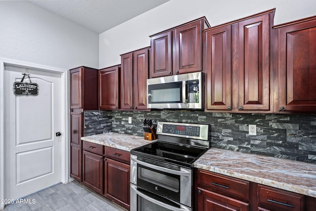 7911 E Posada Ave, Mesa, AZ 85212 - kitchen with appliances with stainless steel finishes, dark brown cabinets, decorative backsplash, and light stone countertops