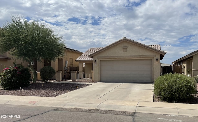 view of front of property with a garage