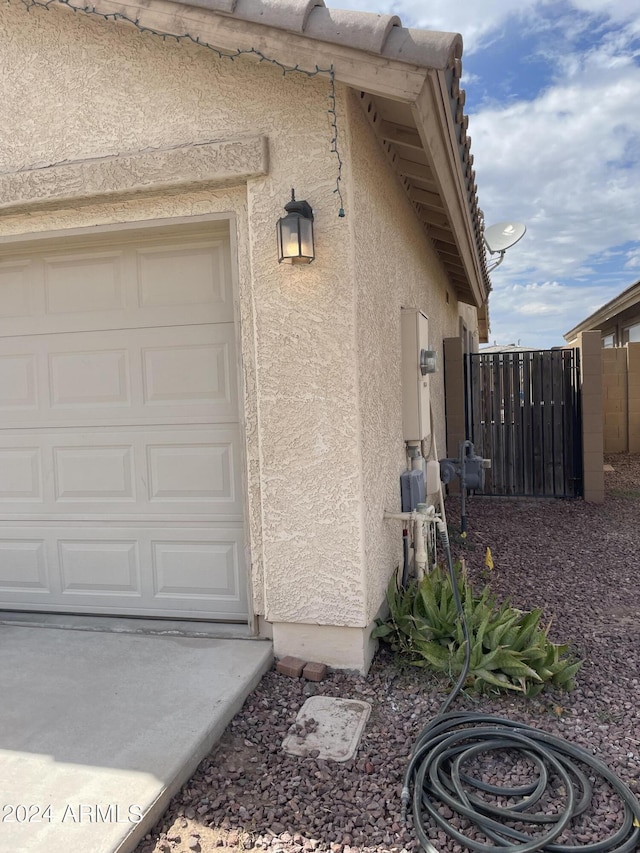 view of home's exterior with a garage