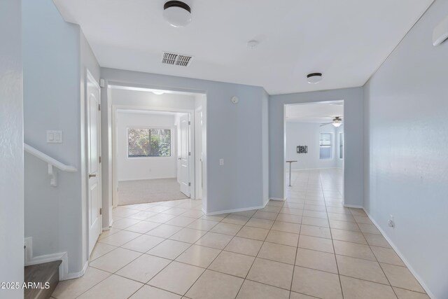 43232 W Magnolia Rd, Maricopa, AZ 85138 - hall with light tile patterned floors and baseboards