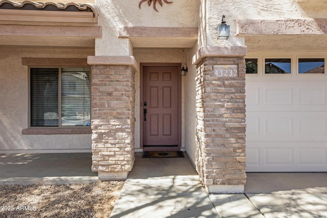 43232 W Magnolia Rd, Maricopa, AZ 85138 - property entrance featuring stucco siding and a garage