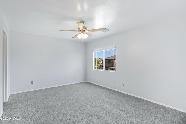 43232 W Magnolia Rd, Maricopa, AZ 85138 - carpeted empty room featuring ceiling fan and baseboards