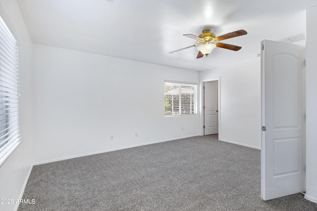 43232 W Magnolia Rd, Maricopa, AZ 85138 - carpeted empty room with a ceiling fan and baseboards