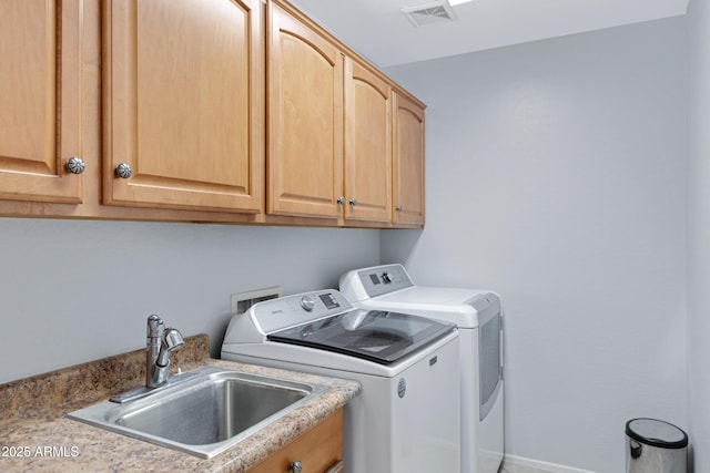 43232 W Magnolia Rd, Maricopa, AZ 85138 - washroom with washing machine and dryer and cabinet space