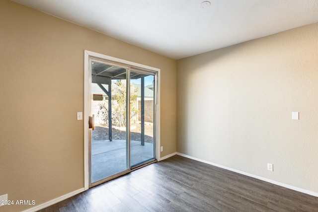 unfurnished room featuring hardwood / wood-style floors