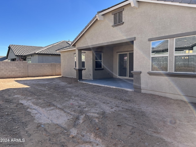 rear view of house with a patio area