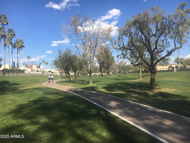 surrounding community featuring a lawn