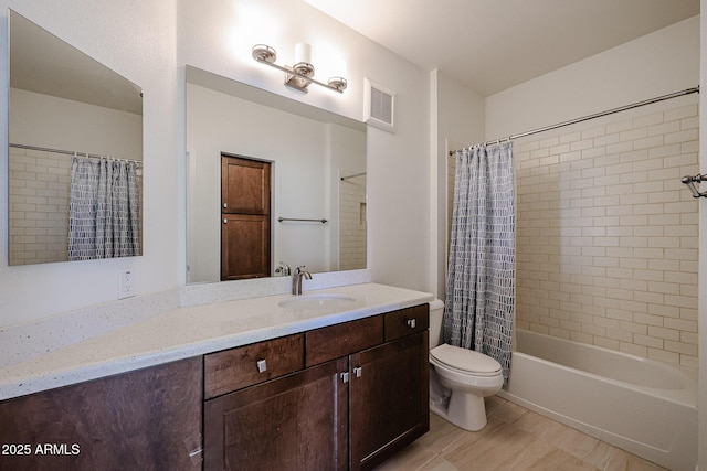 bathroom with vanity, shower / bath combination with curtain, toilet, and visible vents