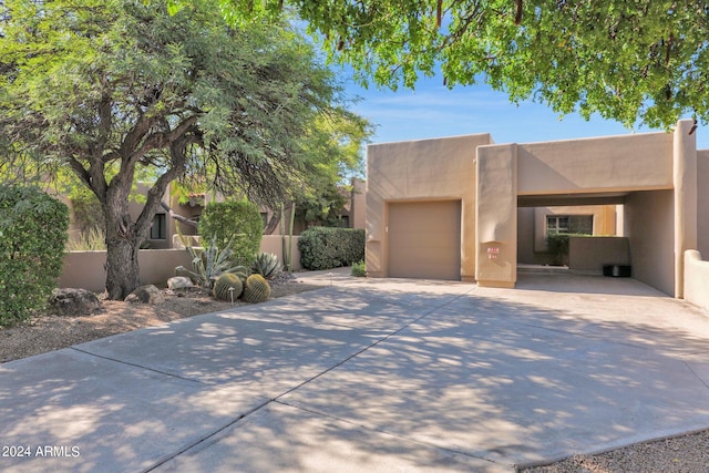 adobe home with a garage