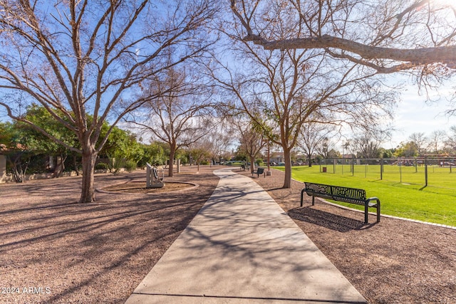 view of home's community featuring a lawn