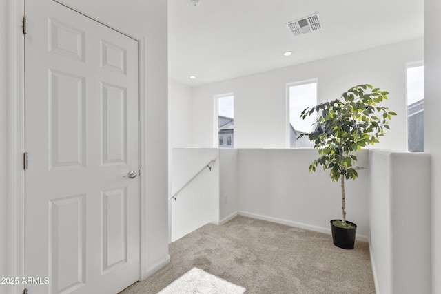 15718 W Polk St, Goodyear, AZ 85338 - carpeted empty room with baseboards and recessed lighting