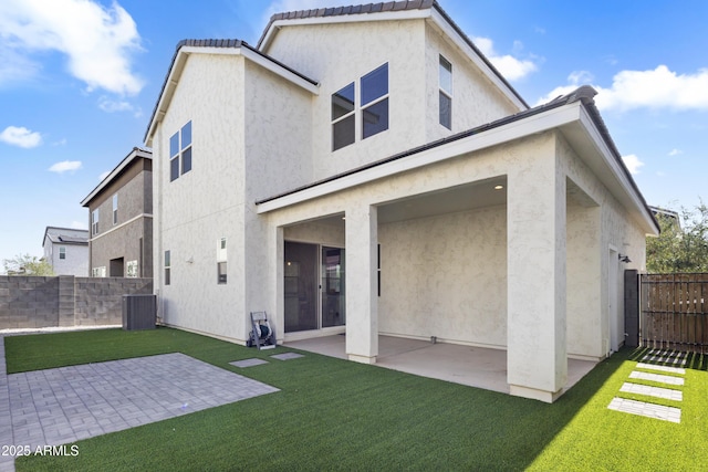 15718 W Polk St, Goodyear, AZ 85338 - back of house featuring a patio area, stucco siding, and central AC unit