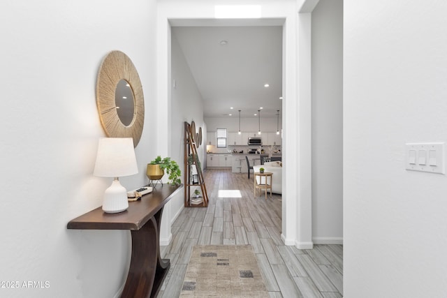 15718 W Polk St, Goodyear, AZ 85338 - hall with light wood-type flooring, baseboards, and recessed lighting