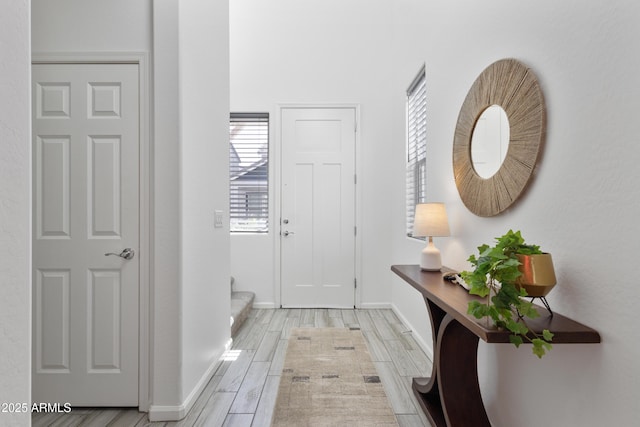 15718 W Polk St, Goodyear, AZ 85338 - foyer with light wood-style floors and baseboards