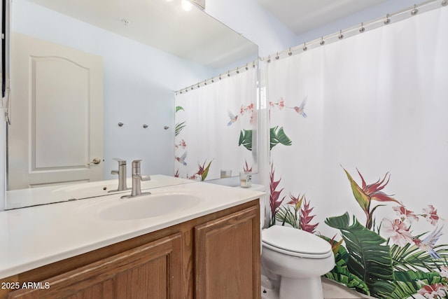 full bathroom with vanity, toilet, and a shower with curtain