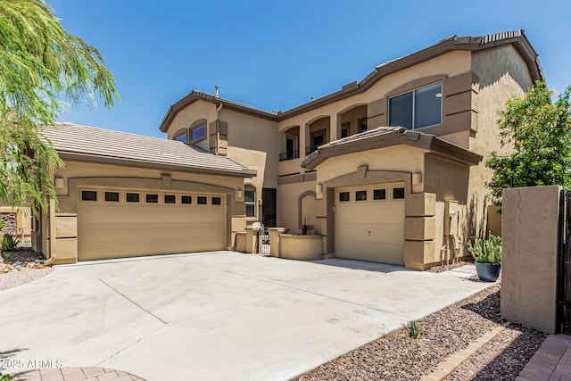 5437 W Red Bird Rd, Phoenix, AZ 85083 - mediterranean / spanish-style home with concrete driveway, stucco siding, and a tiled roof