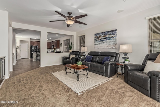 5437 W Red Bird Rd, Phoenix, AZ 85083 - living room featuring dark colored carpet, a ceiling fan, and recessed lighting