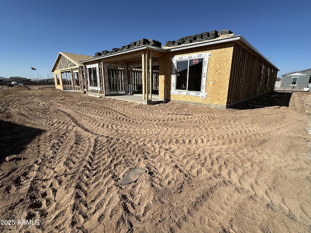 rear view of property with a patio area