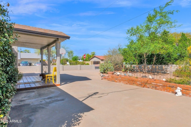 view of patio with fence