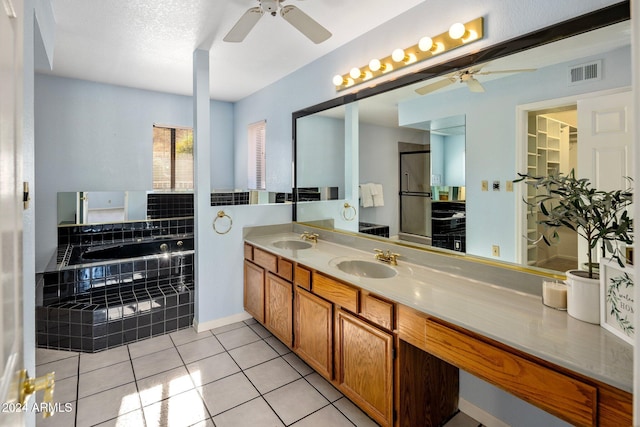 1017 E Grandview Rd, Phoenix, AZ 85022 - full bathroom featuring a ceiling fan, tile patterned floors, double vanity, and a garden tub