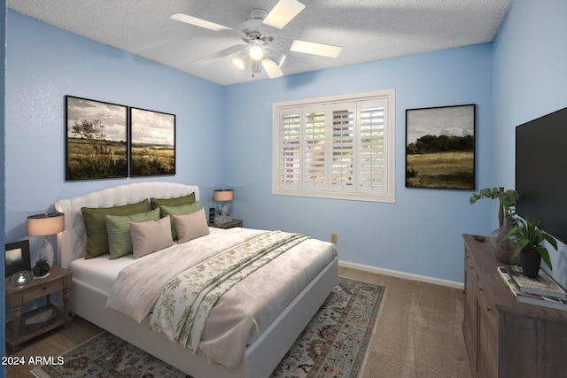 1017 E Grandview Rd, Phoenix, AZ 85022 - carpeted bedroom featuring a textured ceiling, baseboards, and ceiling fan
