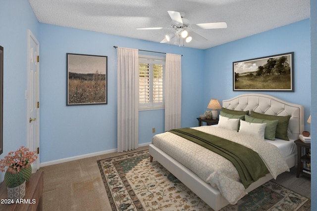 1017 E Grandview Rd, Phoenix, AZ 85022 - carpeted bedroom featuring ceiling fan, baseboards, and a textured ceiling