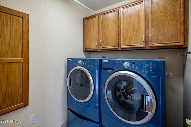 1017 E Grandview Rd, Phoenix, AZ 85022 - washroom with cabinet space and washer and dryer