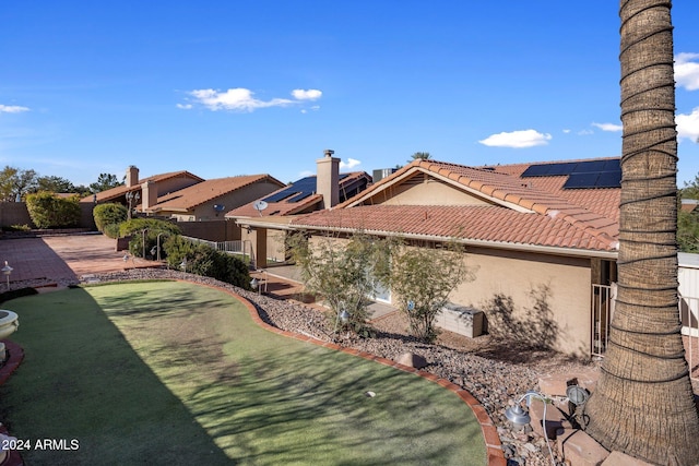 1017 E Grandview Rd, Phoenix, AZ 85022 - fenced backyard featuring an area to practice putting
