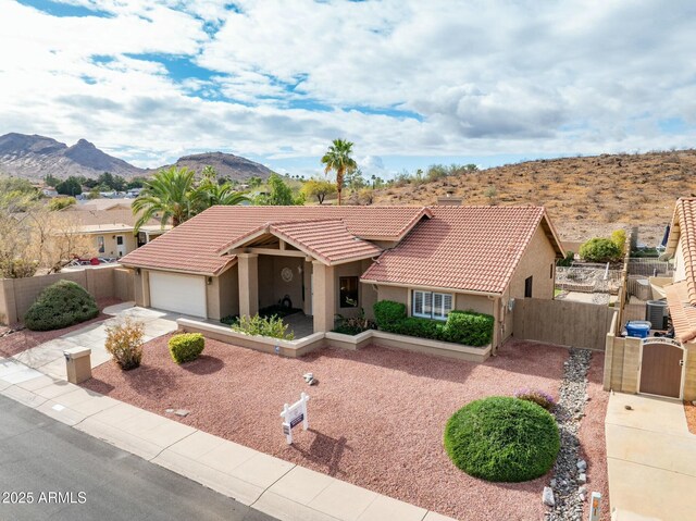 1017 E Grandview Rd, Phoenix, AZ 85022 - view of front of property featuring a gate, stucco siding, a tile roof, and fence