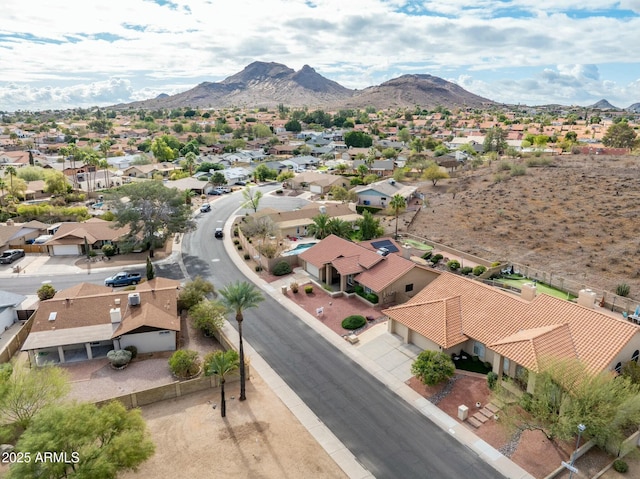 birds eye view of property featuring a mountain view and a residential view