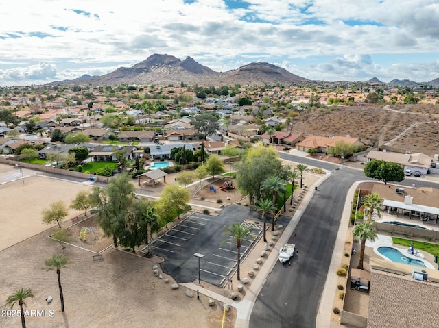 birds eye view of property featuring a mountain view and a residential view